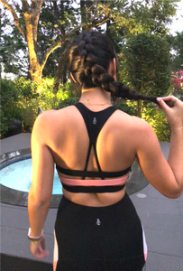 Black and coral sports bra